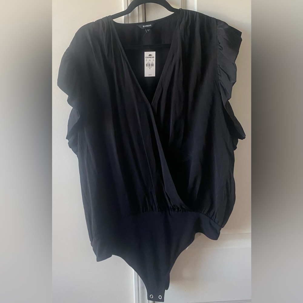 Express body suit. Never worn NWT. Size XL